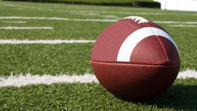 A football rests on the field.